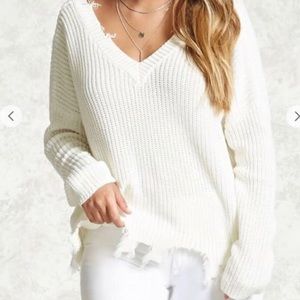 White distressed sweater